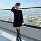 Vestido elegante negro con botones Bonnie