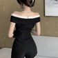 Jumpsuit corto elegante blanco y negro Moni