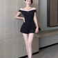 Jumpsuit corto elegante blanco y negro Moni